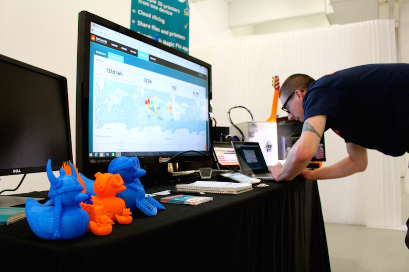 Charles showing off the world statistics dashboard found and data tracking from 3DPrinterOS.