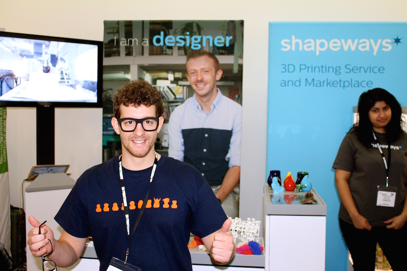 Aaron having some fun at Shapeways booth with their 3D printed glasses. 